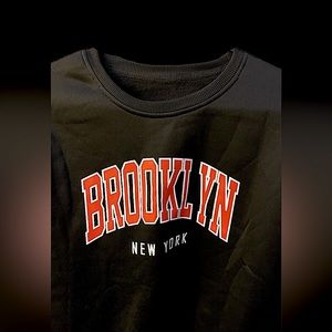 black Brooklyn NY crew neck hoodie.
